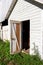 Deteriorating 19th century barn wall and door texture background