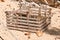 deteriorating lobster trap, on a sandy beaching