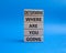 Determination symbol. Wooden blocks with words Determine where you are going. Beautiful blue background. Business and Determine