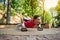 Determined active muscular woman pushing ups from floor while performing full body functional cross training outdoors