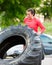 Determined Athlete Flipping Tractor Tire