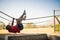 Determined boy crossing the rope during obstacle course