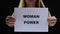 Determined lady holding woman power sign, social standards change, freedom