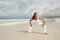 Determined mature woman exercising beach