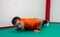 Determined strong young man doing push-ups
