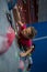 Determined teenage girl practicing rock climbing