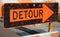 Detour sign with arrow