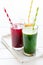 Detox drinks in glass: fresh smoothies from vegetables: beet, pumpkin and spinach