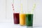 Detox drinks in glass: fresh smoothies from vegetables: beet, pumpkin and spinach