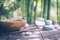 Detox food concept: an empty wooden bowl, wooden chopsticks, bamboo, stones on an old wooden table.