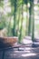 Detox food concept: an empty wooden bowl, wooden chopsticks, bamboo, stones on an old wooden table.