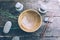 Detox food concept: an empty wooden bowl, wooden chopsticks, bamboo, stones on an old wooden table.