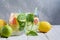 Detox refreshing sassy water with cucumber, ginger, mint and lemon in glasses