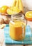 Detox smoothie of banana, orange, mango, ginger