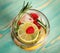Detox water with citrus, raspberry, rosemary, close-up