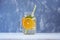 Detox water with lemon, orange and mint. Glass jar.The concept i