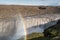 Dettifoss falls in summer with rainbow