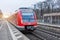 Deutsche Bahn intercity train locomotive leaves from suburban station. Germany, Frankfurt am Main. 14 december 2019