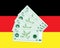 Deutsche mark notes on a German flag background
