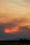 Devastating wildfire in Alexandroupolis Evros Greece, Aerial firefighting waterbombing planes, smoke covered the sky, sunset