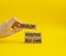 Develop positive self-care symbol. Concept words Develop positive self-care on wooden blocks. Beautiful yellow background.