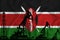 Developing Flag of kenya. Silhouette of drilling rigs and oil rigs on a flag background. Oil and gas industry. The concept of oil