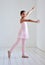 Developing her love for dance. Portrait of a little girl practicing ballet in a dance studio.
