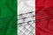 Developing Italy Flag, mesh fence and barbed wire. Concept of isolation of emigrants. With place for your text