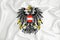 A developing white flag with the coat of arms of Austria. Country symbol. Illustration. Original and simple coat of arms in