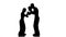 Development of straight kicks kickboxing on boxing paws. Silhouette. White background