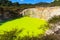 The `Devil`s Bath`, a brightly colored geothermal lake in Waiotapu, NZ