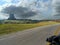 Devil`s Tower National Monument from a distance on a motorcycle