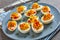 Deviled Eggs on a grey plate, close-up