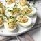 Deviled eggs on a white plate