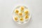 Deviled stuffed eggs with egg yolk, bacon, mustard and dill