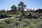 Devils Orchard trail in Craters of the Moon National Monument near Arco, Idaho. Desert sagebrush and volcanic rock surrounded the