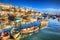 Devon boats Brixham England UK English harbour with brilliant blue sky