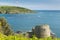 Devon coast Salcombe England uk in summer with Charles Fort ruins and pilot gig boats