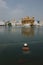 A devotee in nectar pool of Golden Temple