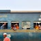 Dhaka,Bangladesh-01/11/2020:Bangladesh railway-A family waving goodbye from the window from a crowded train while leaving Dhaka