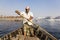 Dhaka, Bangladesh, February 24 2017: Close-up view of a rower in a taxi boat from the perspective of the passenger