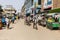 Dhaka, Bangladesh, February 24 2017: Trishaw driver and resident along the shopping street in Dhaka