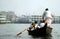 Dhaka, Bangladesh: Transporting local people by small boat across the river at Sadarghat
