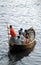 Dhaka, Bangladesh: Transporting local people by small boat across the river at Sadarghat, Dhaka