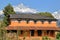 DHAMPUS, NEPAL: Traditional house near Dhampus village near Pokhara with Machapuchare Peak in the background