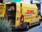 DHL courier cargo van delivering in Milan