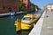 DHL Delivery Boat moored on the Rio dell Arsenale Venice Italy.