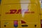 DHL express delivery van yellow car courier logistic truck with logo brand and text