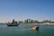 Dhow boats moored in water in Doha