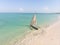 Dhow Catamaran sail boat near the White sand Beach in Paje village on Zanzibar